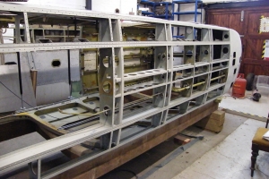 Fuselage underside with the belly skin removed to enable under floor frames to be de-corroded and repaired, January 2013  © Bob Wealthy